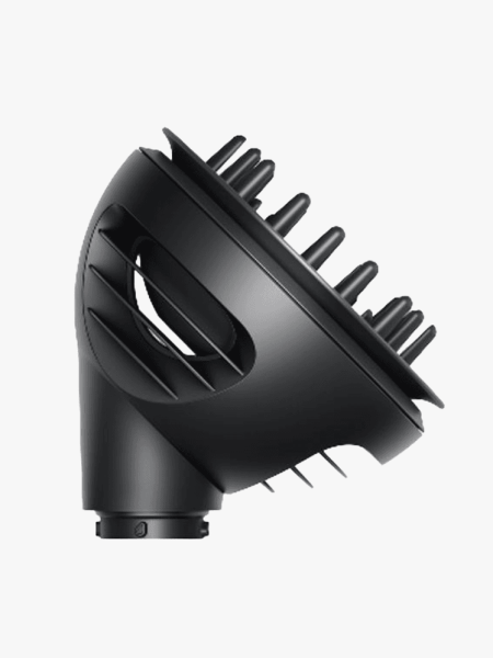 A Dyson Airwrap Wave+Curl Diffuser Attachment on a light gray background
